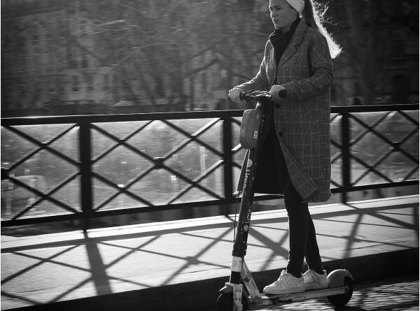 Scooter sur le pont by Ian Hardacre